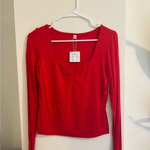Fitted Red Blouse with Long Sleeves